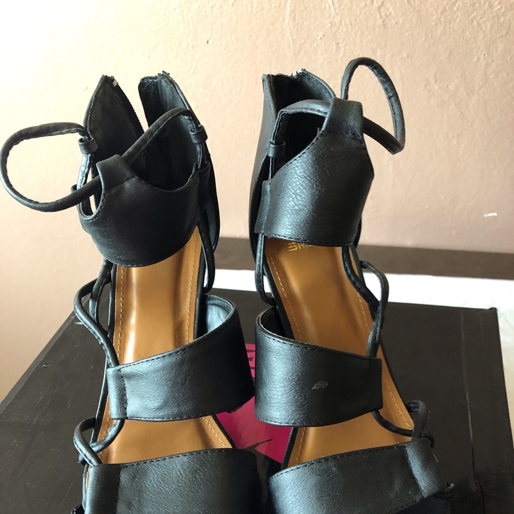 Black open toe heels back zipper.